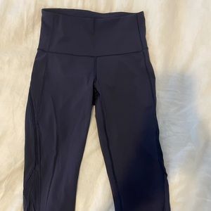 Navy Blue Lululemon crop leggings with mesh detail!